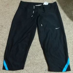 Nike running capris. About knee length